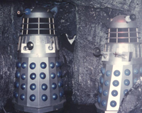 Dalek B1 (left) circles Dalek SM2 in 1979. Photo - Roger M Dilley